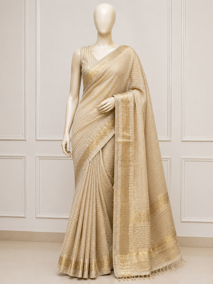 SHONAR RONG- Cream cotton silk saree with gold checks & woven temple border comes with blouse piece.