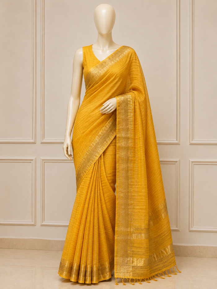 HOLUD PAKHI- Yellow cotton silk saree with gold checks & woven temple border comes with blouse piece.