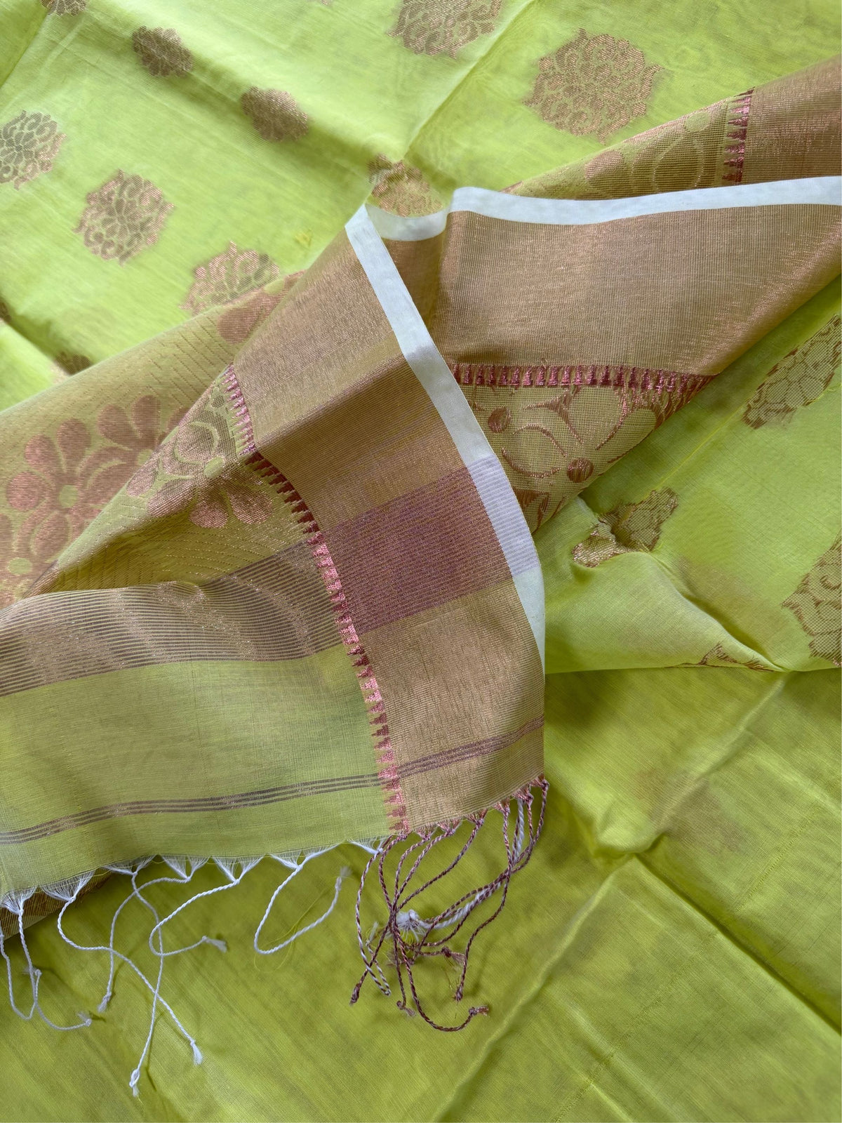 SHOBUJ SWAPNO - Parrot green cotton silk saree with zari work comes with blouse piece.