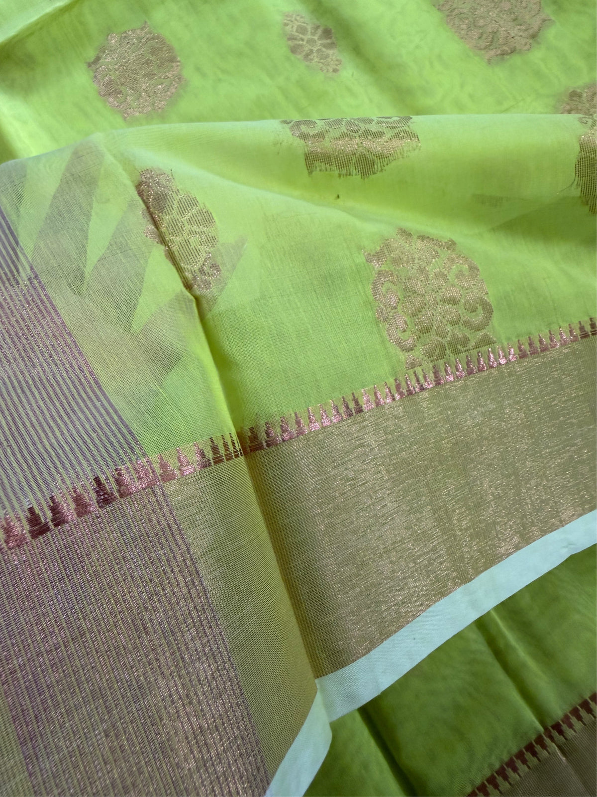 SHOBUJ SWAPNO - Parrot green cotton silk saree with zari work comes with blouse piece.