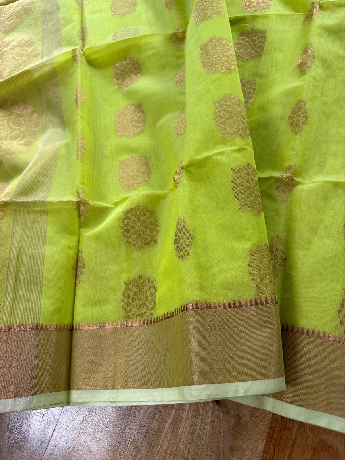 SHOBUJ SWAPNO - Parrot green cotton silk saree with zari work comes with blouse piece.