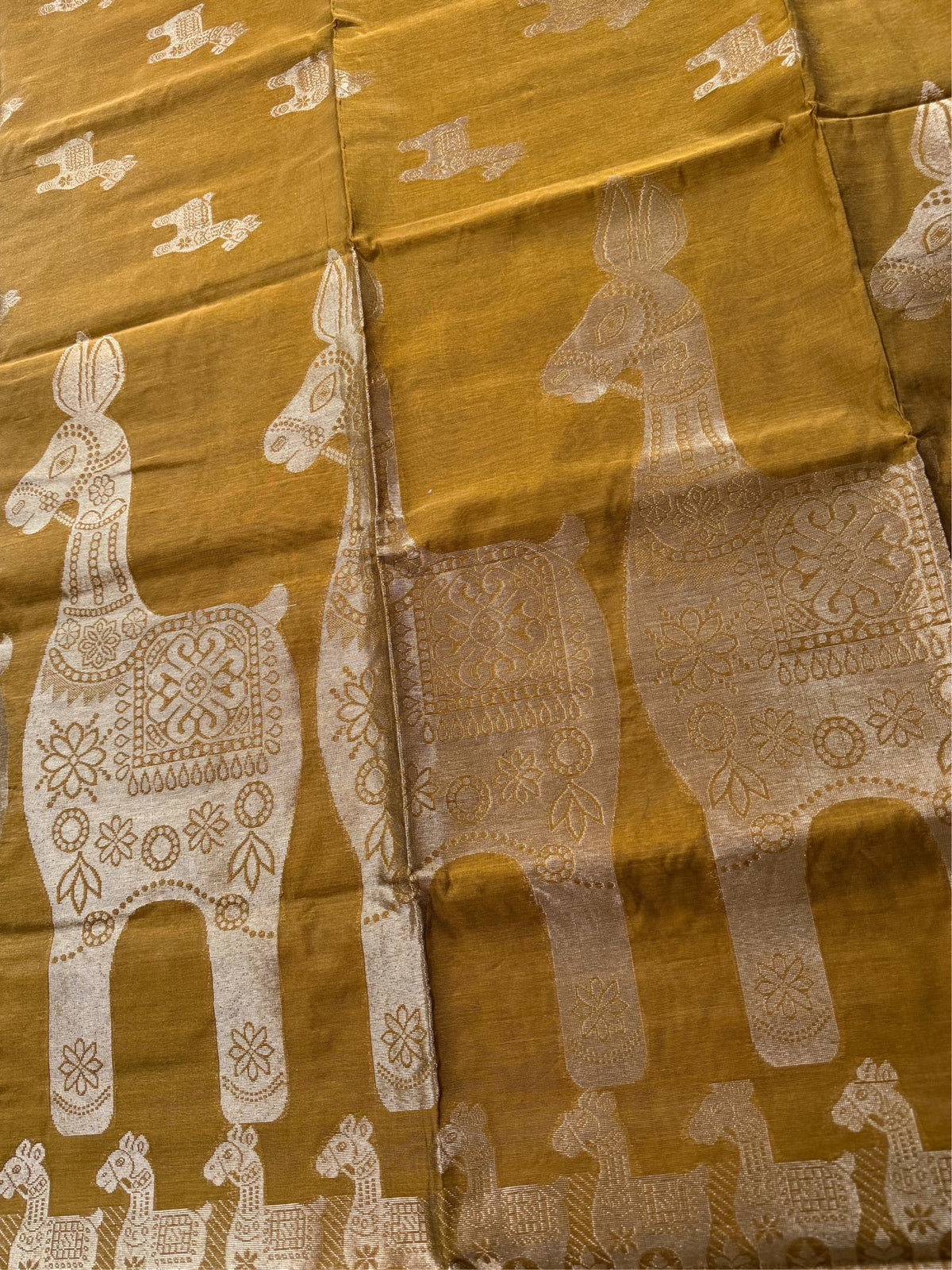 SONAR CHAYYA- Brown cotton silk saree with zari work comes with blouse piece.