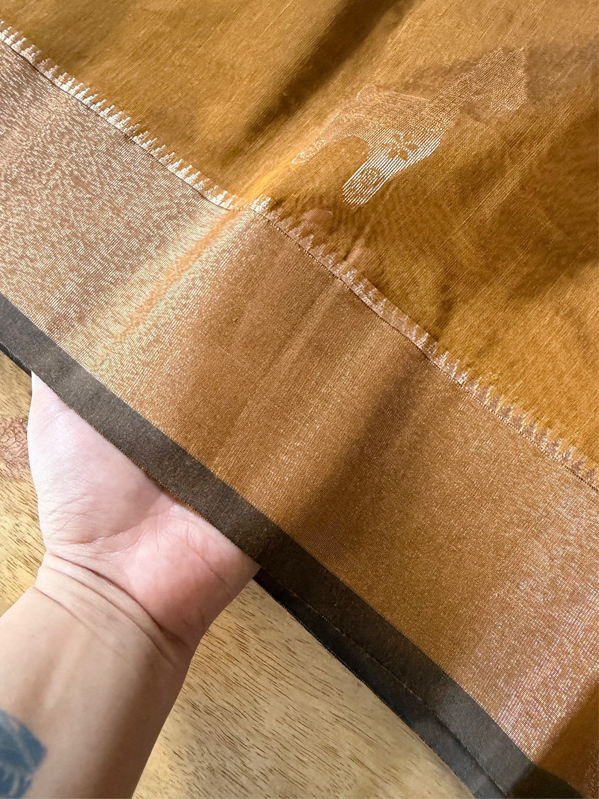 SONAR CHAYYA- Brown cotton silk saree with zari work comes with blouse piece.