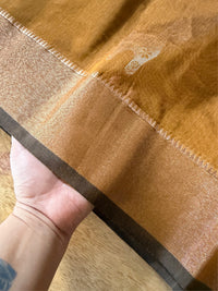 SONAR CHAYYA- Brown cotton silk saree with zari work comes with blouse piece.