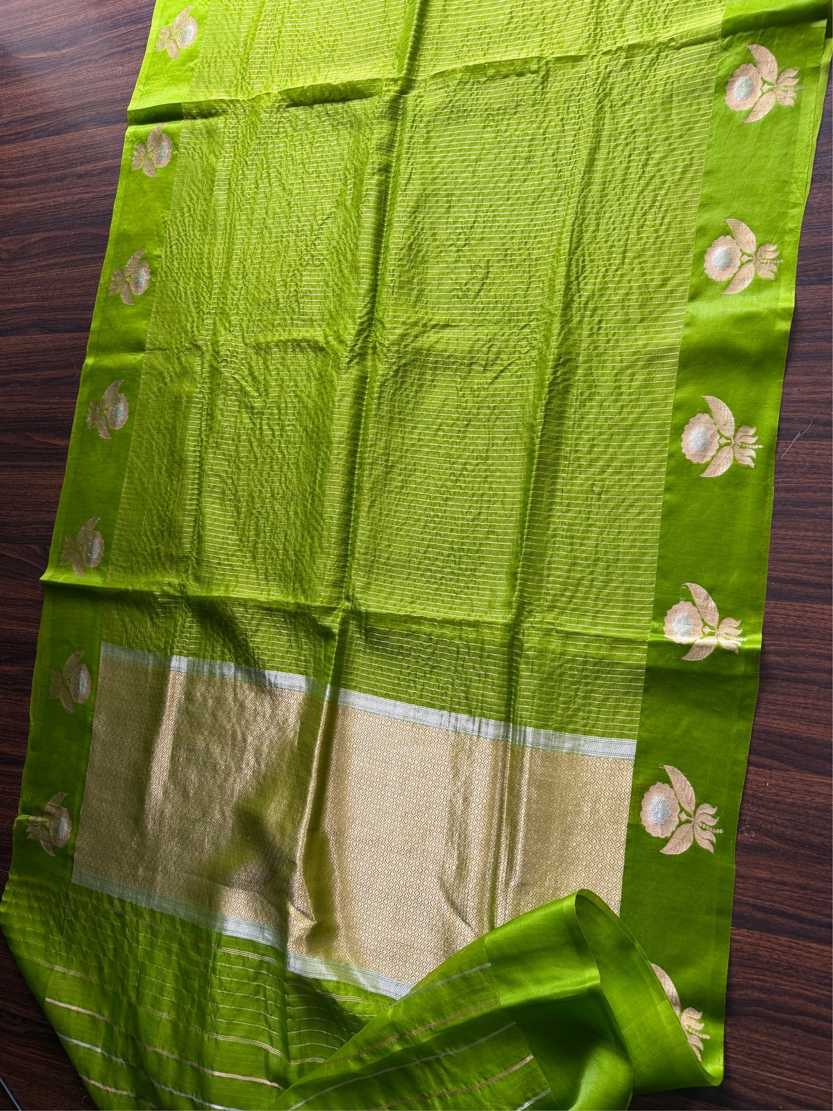 EMERALD BLOOM -Green with gold zari work comes with blouse piece